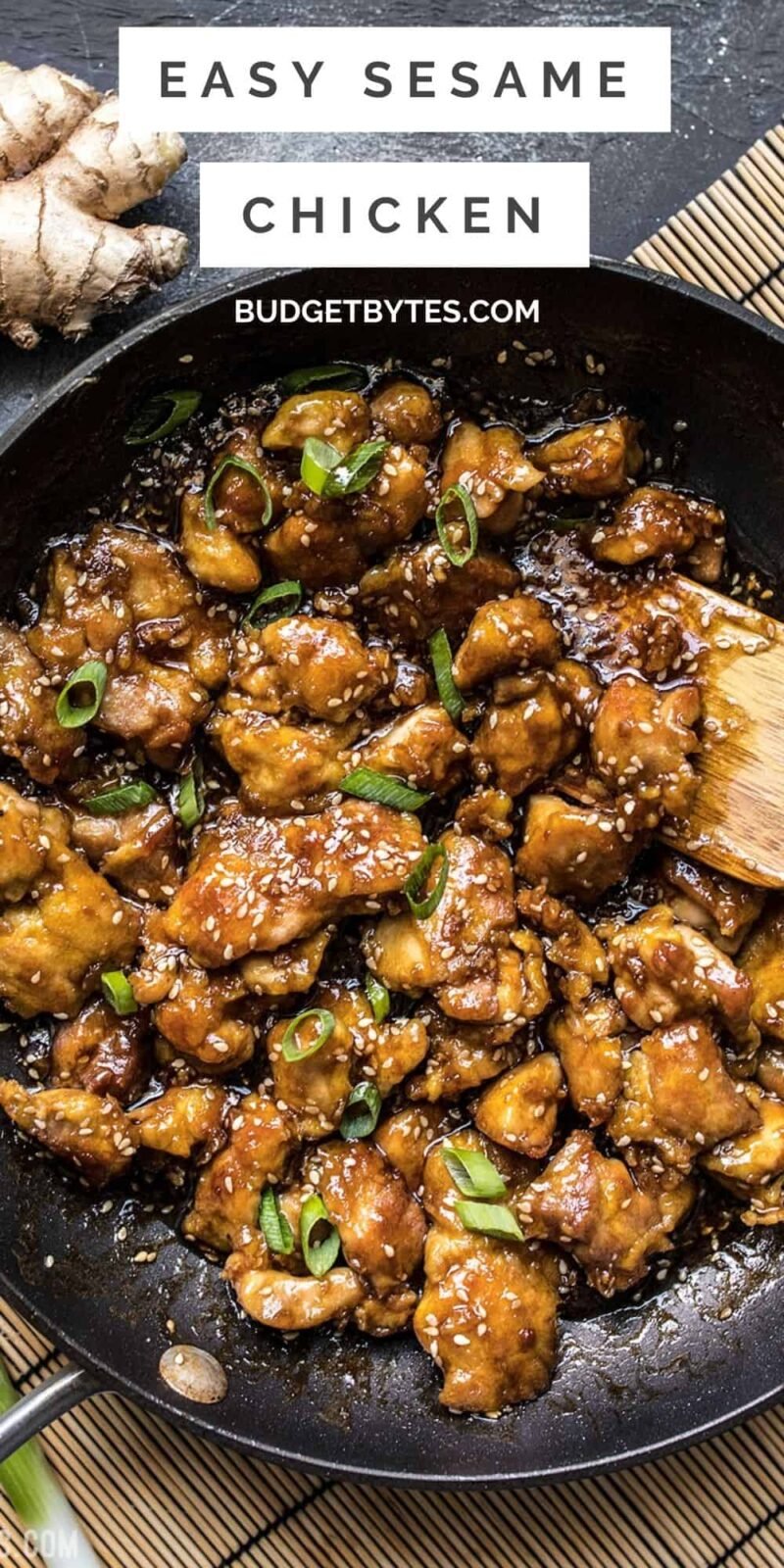 Overhead view of sesame chicken in a skillet, title text at the top
