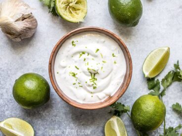This tangy, creamy, fresh, and garlicky Lime Crema is the key to taking your tacos, nachos, salads, and more to the next level. Budgetbytes.com