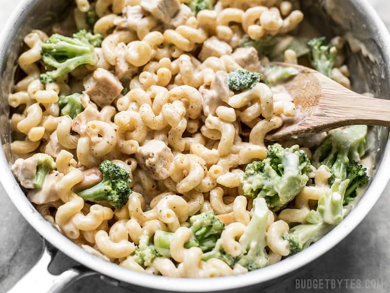 Close up of White Cheddar Mac and Cheese with broccoli in the skillet