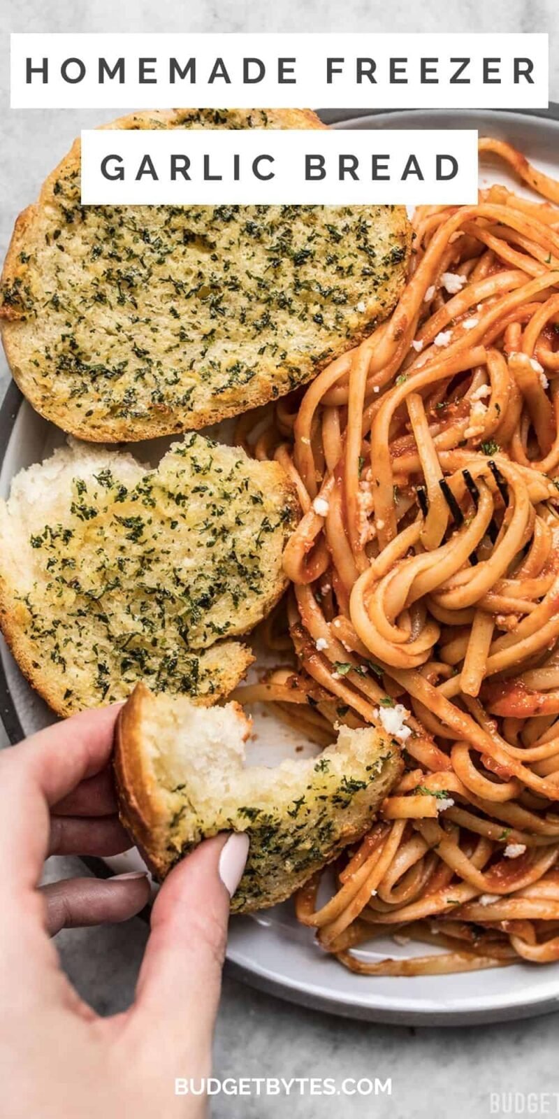 Pieces of garlic bread on a plate of pasta, title text at the top