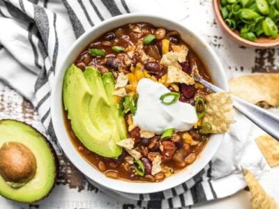 This Slow Cooker Vegetarian Lentil Chili makes a huge batch, is packed with flavor and nutrients, and can be made for only about 5 dollars! Budgetbytes.com