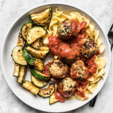 Spinach and Feta Turkey Meatballs are an easy way to add flavor and protein to your meal using inexpensive ground turkey. Perfect for meal prep! Budgetbytes.com
