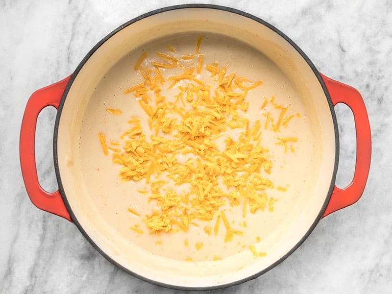 Add Cheddar to Cheesy Cauliflower and Potato Soup