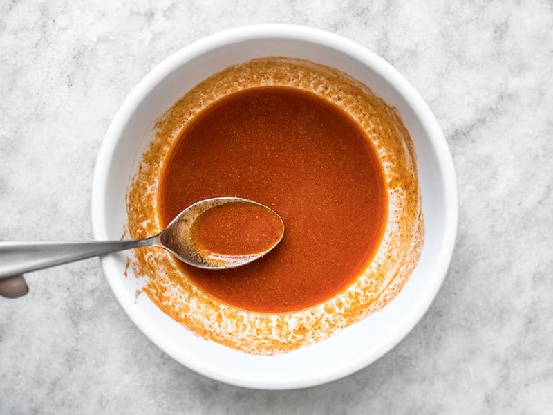 Buffalo Sauce in a small bowl