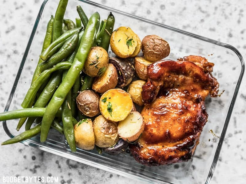 One glass Glazed Chicken Meal Prep container