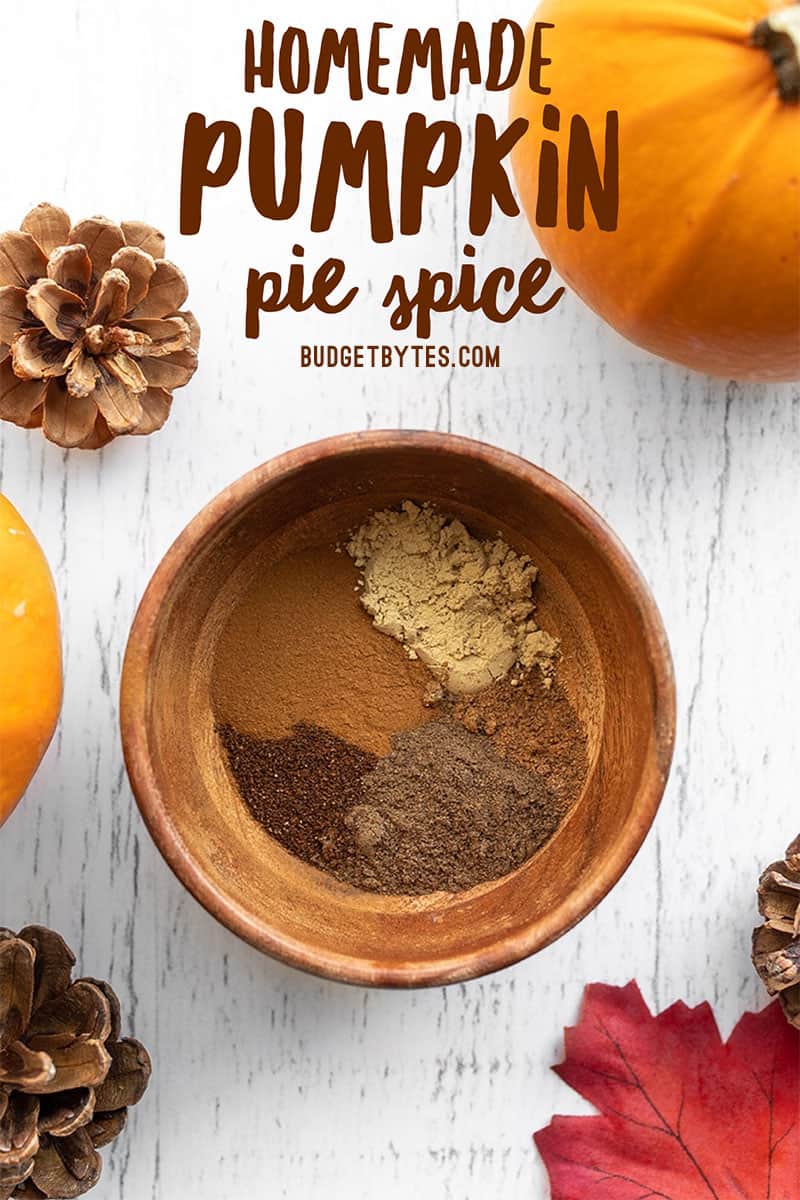 homemade pumpkin pie spice ingredients in a bowl, title text at the top