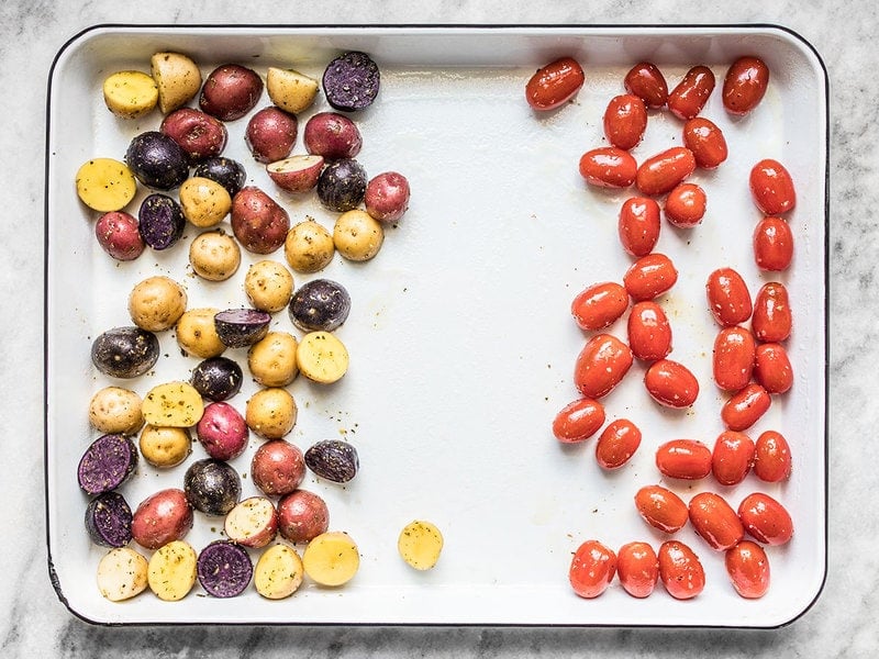 Potatoes and Tomatoes on Baking Sheet