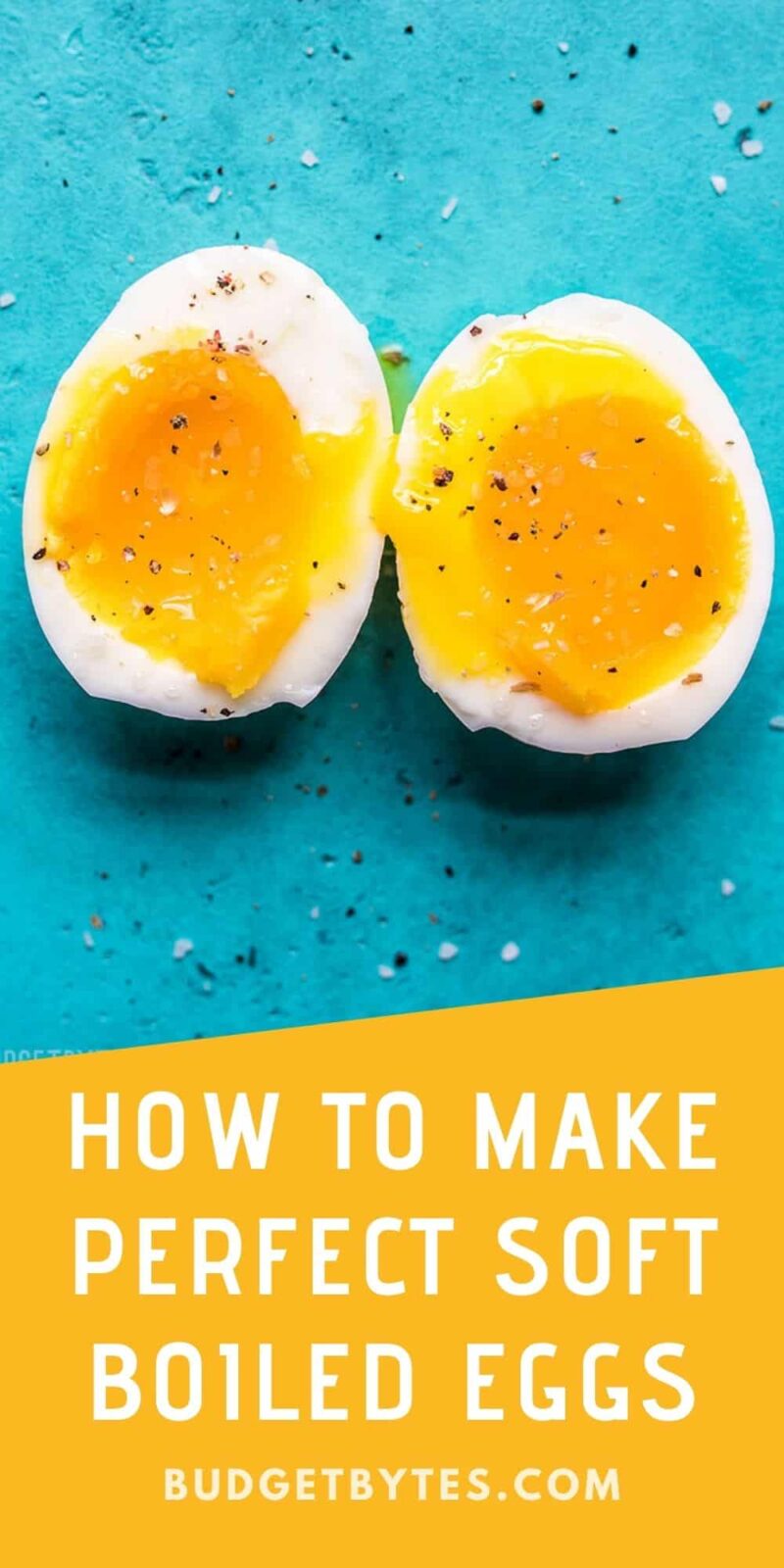 A soft boiled egg sliced in half against a blue background