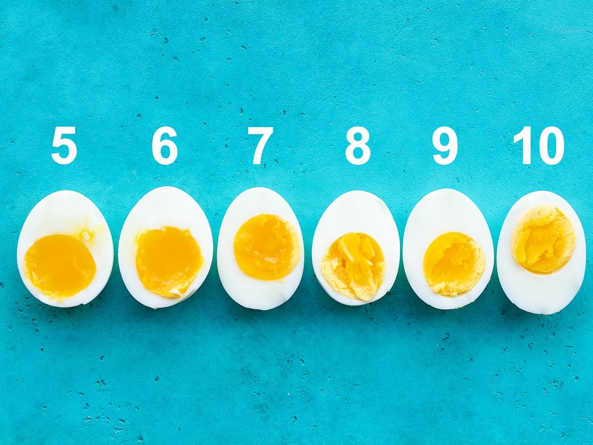 Line up of eggs cooked for different amounts of time