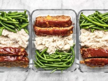 This Cheeseburger Meatloaf Meal Prep is an easy American classic meal that you'll look forward to each day. Toss the TV dinners and make your own! Budgetbytes.com