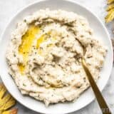 Fluffy as a cloud and with a rich buttery finish, these Garlic Herb Mashed Potatoes will be the star of any weeknight dinner or holiday meal! Budgetbytes.com