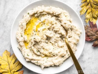 Fluffy as a cloud and with a rich buttery finish, these Garlic Herb Mashed Potatoes will be the star of any weeknight dinner or holiday meal! Budgetbytes.com