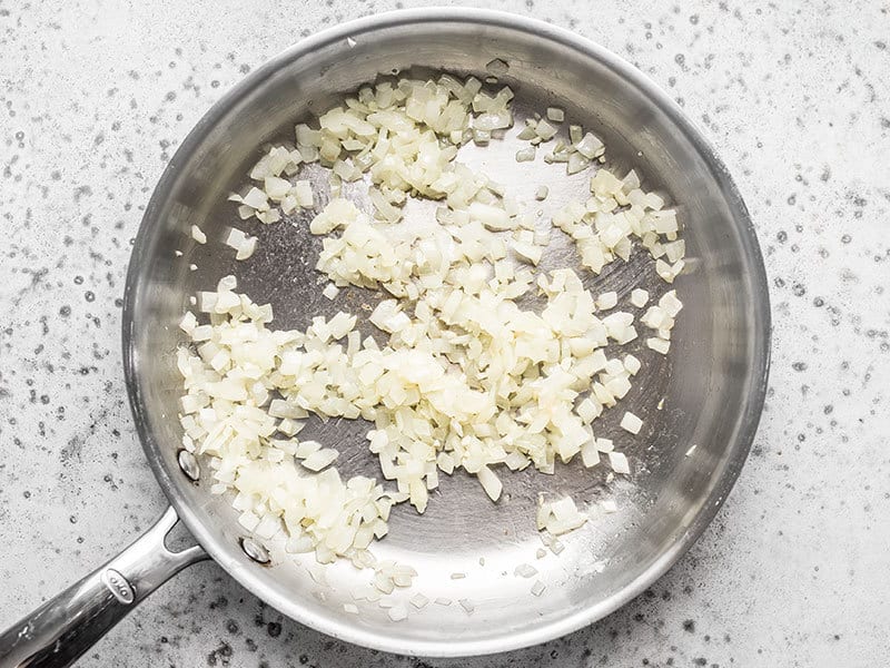 Saute Onion and Garlic for Chipotle Pumpkin Pasta