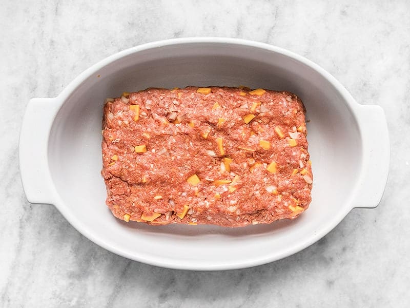 Shaped Cheddar Cheeseburger Meatloaf in a Casserole Dish