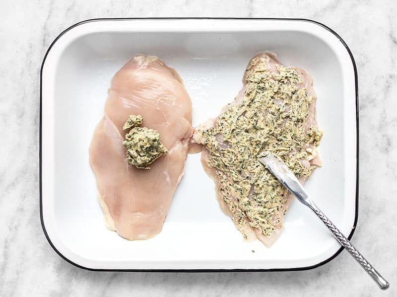 Spread Garlic Herb Butter Over Chicken