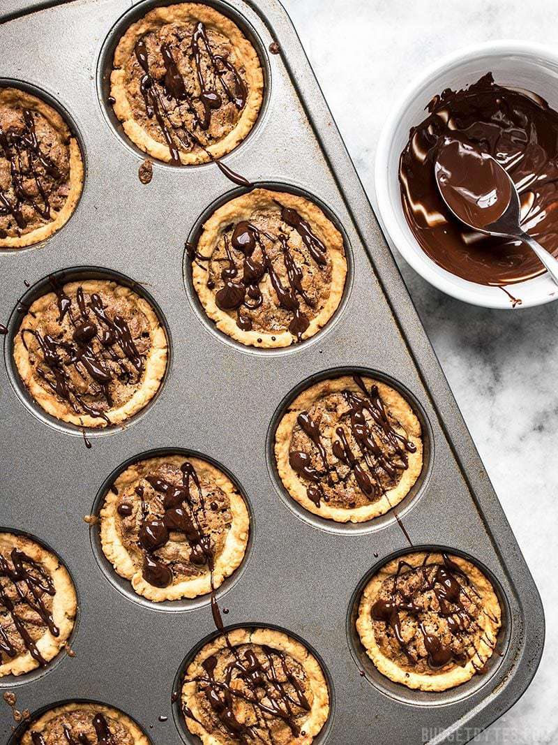 Allow Mini Dark Chocolate Pecan Pies to Cool