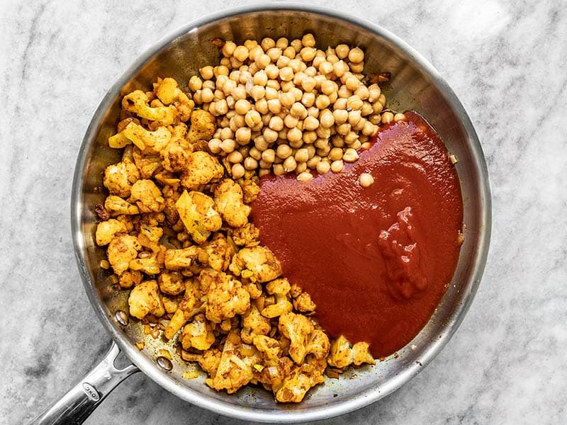 Add Chickpeas and Tomato Sauce to Skillet