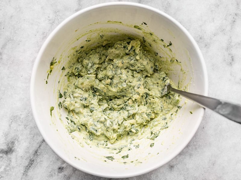 Mashed Scallion Herb Avocado Dressing in the bowl