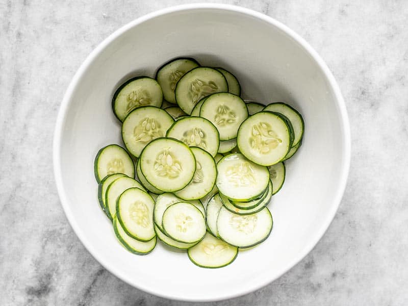Quick pickled cucumbers in a bowl