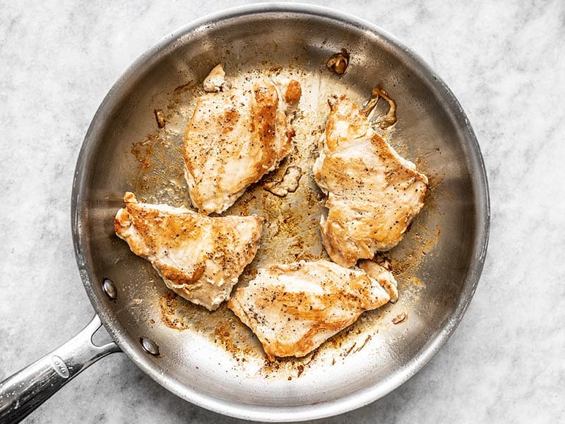 Browned Chicken Breasts in the skillet