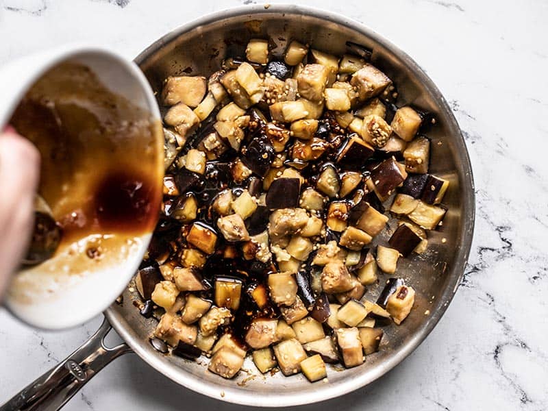 Add Soy Ginger Glaze to Eggplant in skillet