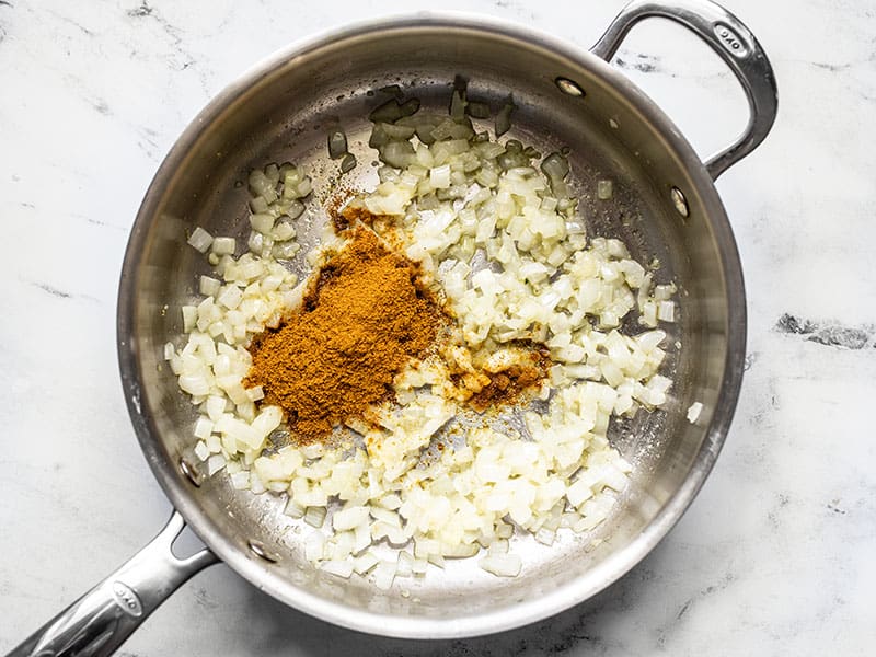 Sautéed onion and curry powder in the skillet