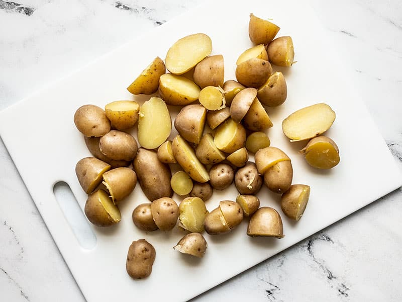 Boiled Potatoes sliced in half.