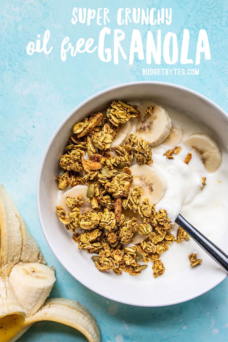 A bowl of yogurt topped with banana slices and Super Crunchy Oil Free Granola