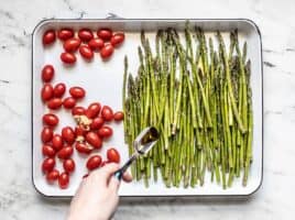 Asparagus and Tomatoes on the baking sheet