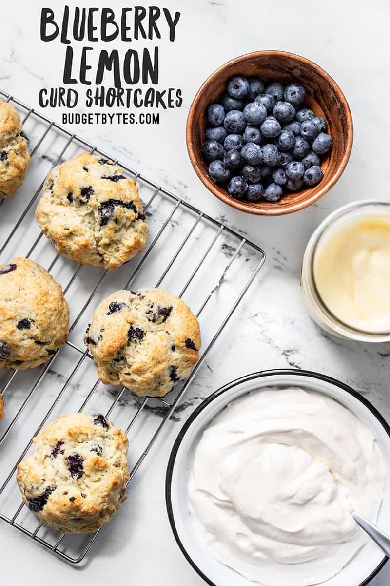 Overhead view of the ingredients for blueberry lemon curd shortcakes with title text at the top