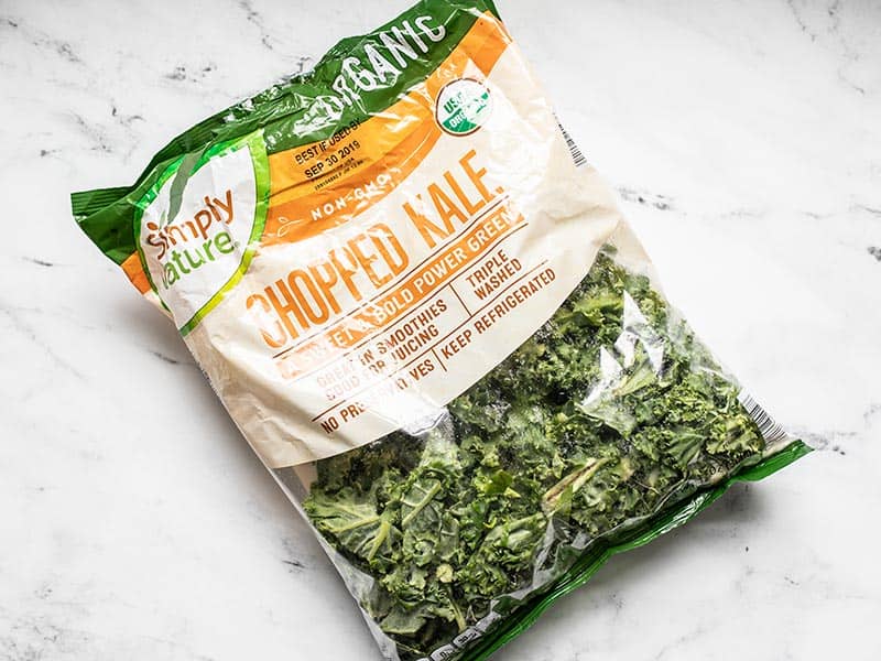 Bag of torn kale leaves