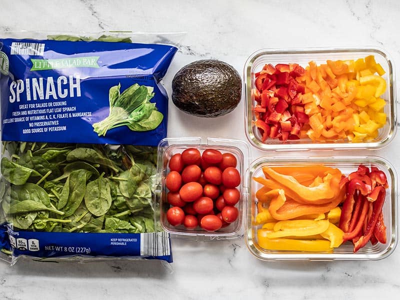 Mix and Match Meal Prep vegetables: spinach, avocado, bell pepper, tomato