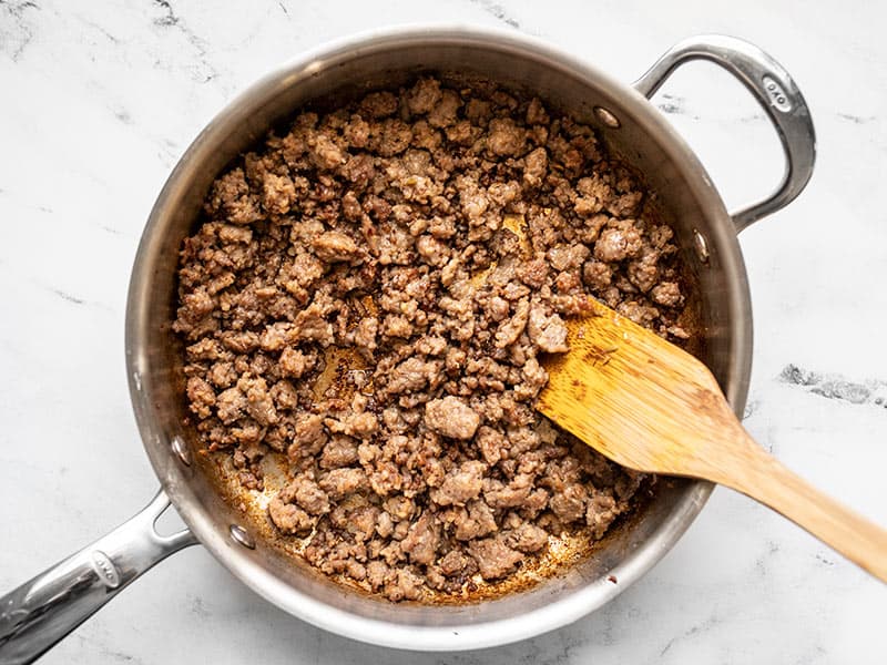 Browned Italian sausage in a skillet