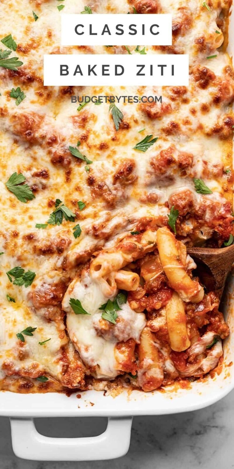 Close up overhead view of baked ziti with title text at the top