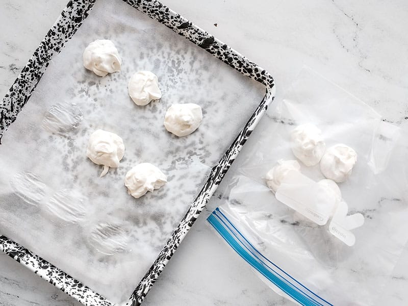 Transfer frozen whipped cream to freezer bag