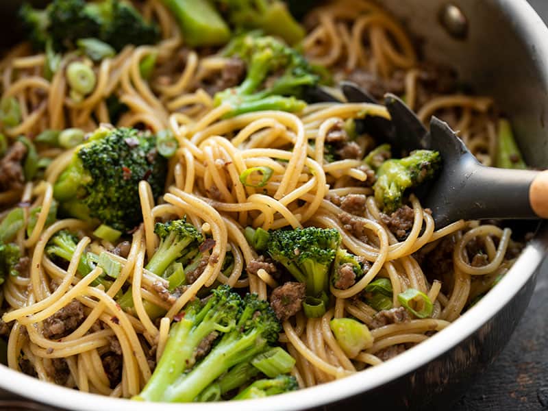 Close up of Garlic Noodles with Beef and Broccoli in the skillet