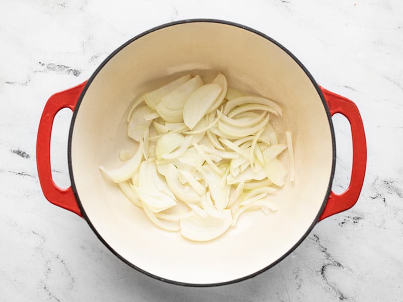 Sliced onions in large pot