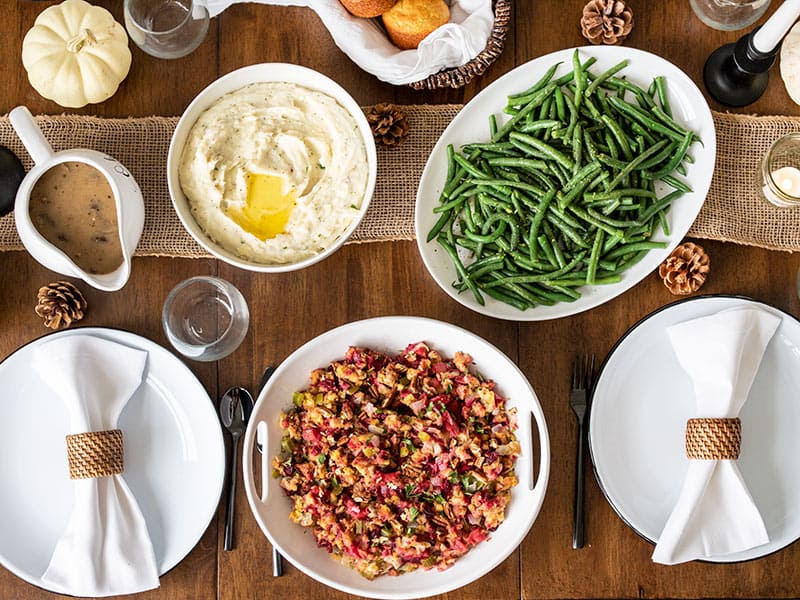 Thanksgiving side dishes on a table from above