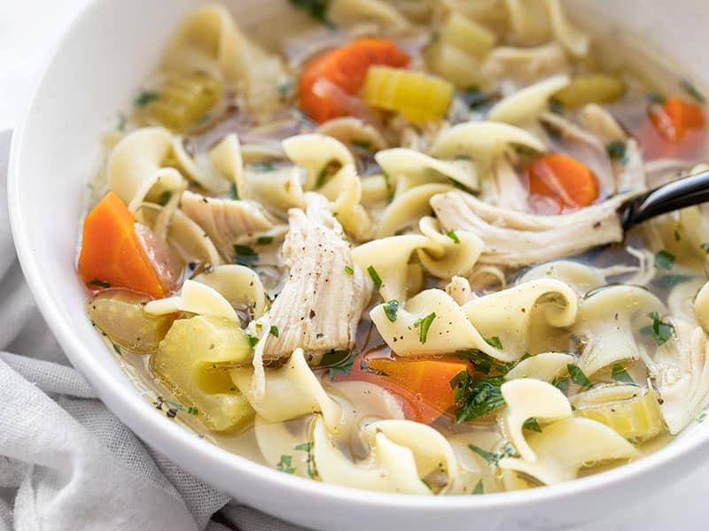 https://www.budgetbytes.com/wp-content/uploads/2020/01/Slow-Cooker-Chicken-Noodle-Soup-bowl-side.jpg