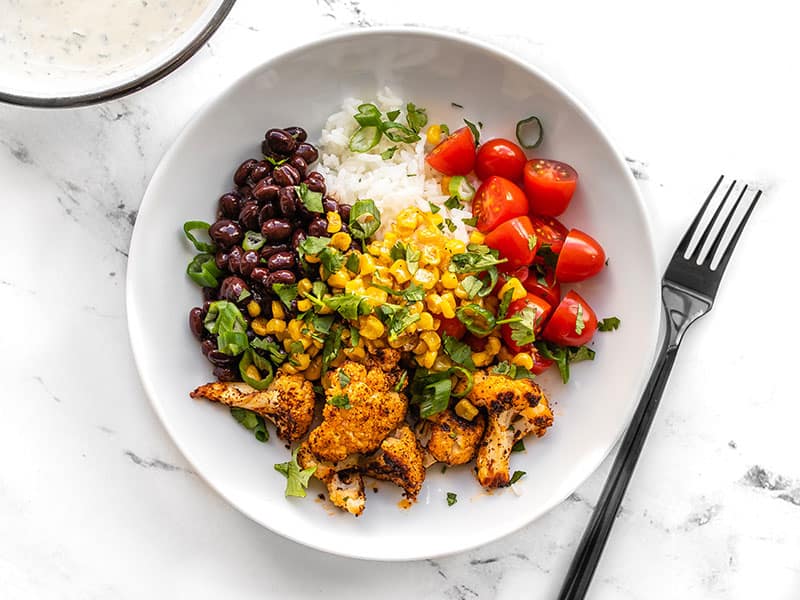 Build the cauliflower taco bowls