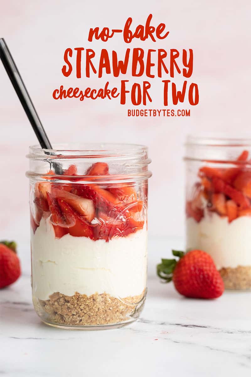 Two jars of no bake strawberry cheesecake, one with a black spoon. Title text at the top