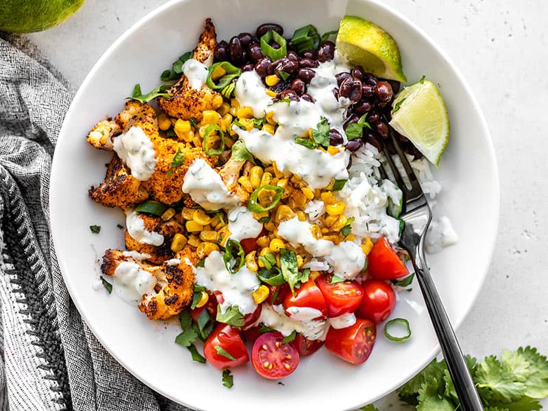 https://www.budgetbytes.com/wp-content/uploads/2020/02/Roasted-Cauliflower-Taco-Bowls-close-above.jpg