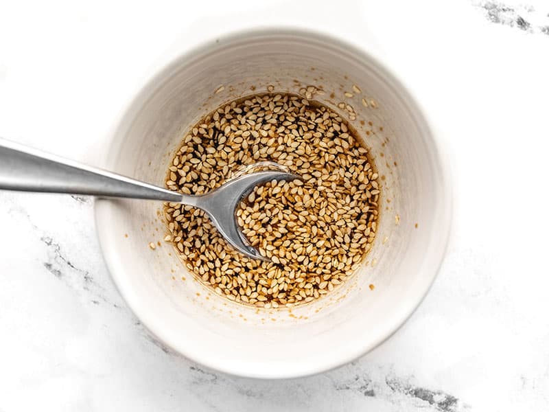 Sesame dressing in a small bowl