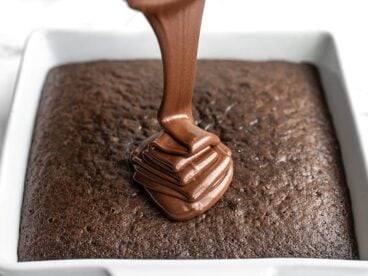 Chocolate Icing being Poured over the baked chocolate cake