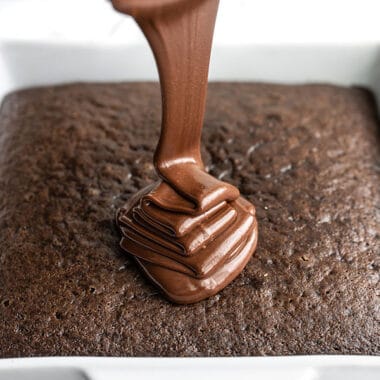 Chocolate Icing being Poured over the baked chocolate cake