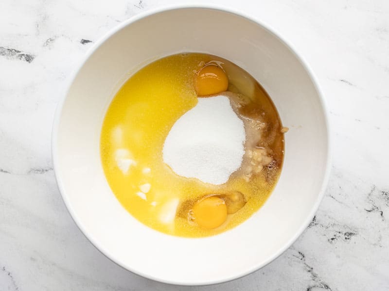 Wet ingredients for banana bread in a bowl