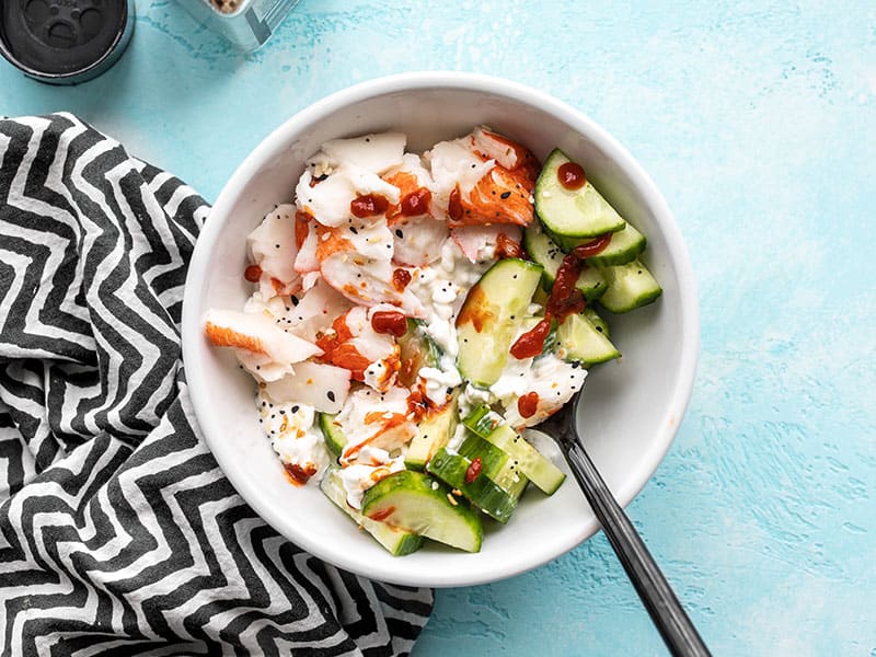 Overhead view of a Cottage Cheese Crab Bowl with a black fork in the side