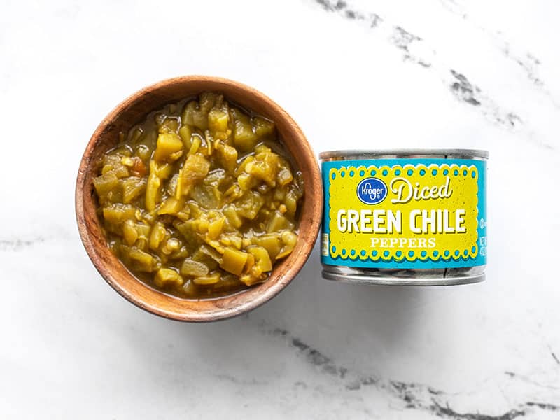 Canned green chiles in the can and in a bowl