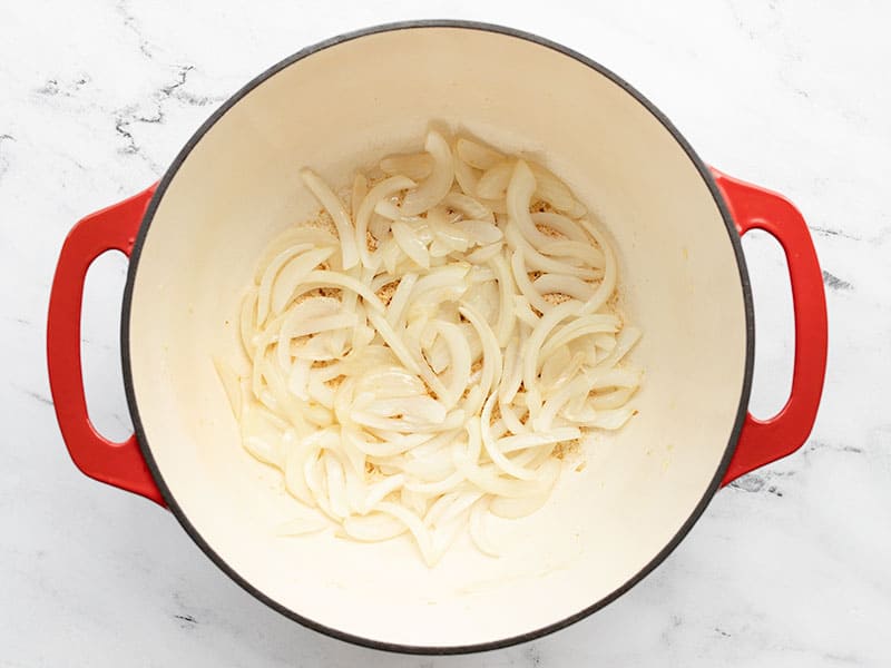 Onions and garlic in a pot with oil