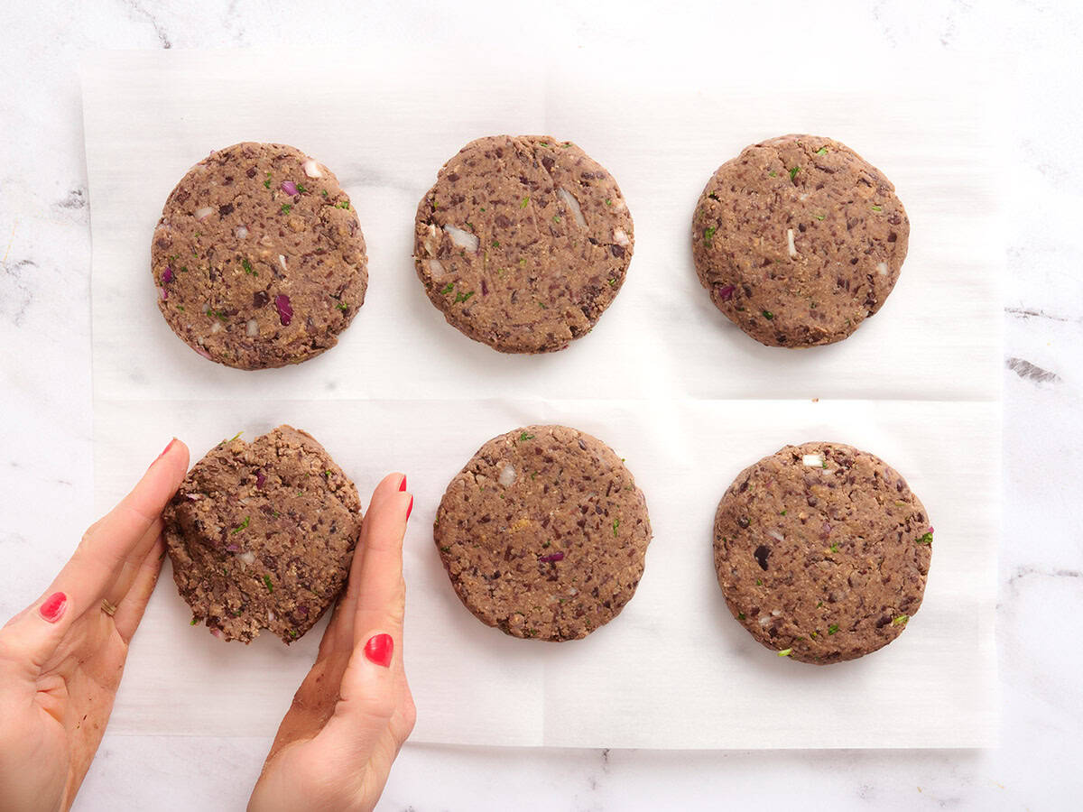 Six formed black bean patties.